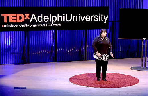 Photo of Dr Deborah Serani at TEDx Adelphi University, talking about her personal and professional experiences living with depression